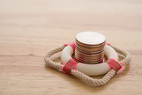 Monedas que representan subsidios de dinero en Colsubsidio